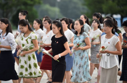 Kim Jong Un urges women to be good comrades — and give birth