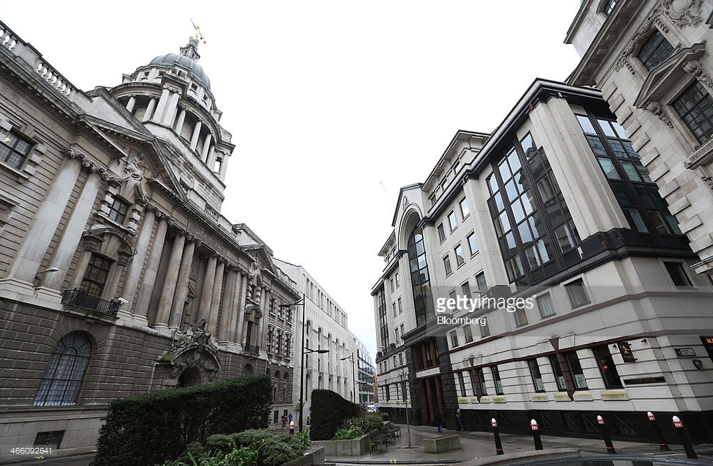 Number 20 Old Bailey, right, stands close to the Central Criminal Court, left, in London, U.K., on Friday, Jan. 31, 2014. U.K. commercial real estate values rose for the eighth straight month in December as investor confidence in property grew, Investment Property Databank Ltd. said. Photographer: Chris Ratcliffe/Bloomberg