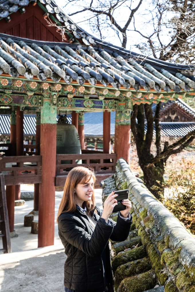 Temple at the foot of Hwangaksan Mountain, shining amid the autumn leaves