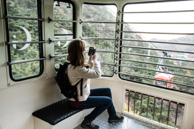 While on a red cable car, I was able to see beautiful mountain terrain, Geumosanseong Fortress, and even downtown Gumi far below. 