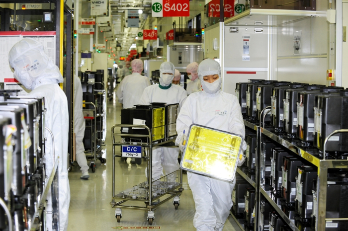 Workers at a SK Hynix chip plant in Icheon