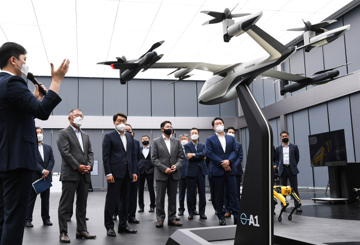 Business leaders touring Hyundai's urban air mobility (UAM) system