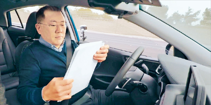 Hyundai Motor Chairman Chung Euisun test drives an autonomous vehicle