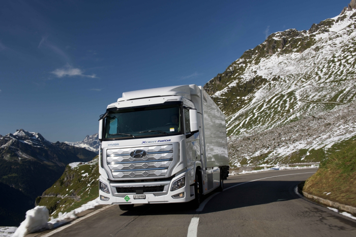 Hyundai's　XCIENT　fuel　cell　heavy-duty　truck　on　a　road　in　Switzerland.