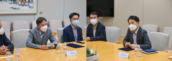 POSCO　and　Doosan　Heavy　representatives　at　the　partnership　agreement　meeting　on　July　19.