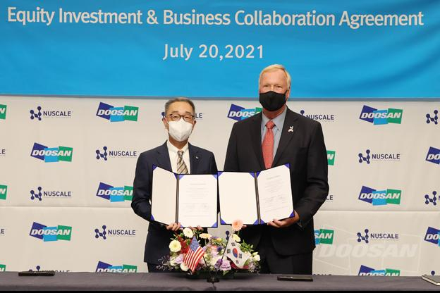 Doosan　Heavy’s　Chairman　Geewon　Park　and　NuScale　Power’s　Chairman　John　Hopkins　sign　an　equity　investment　and　business　collaboration　agreement　July　20