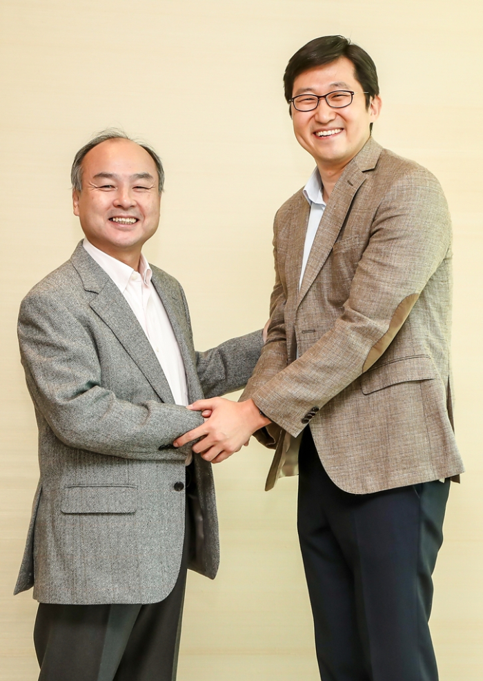 SoftBank Group founder Masayoshi Son (left) is a key investor in Coupang