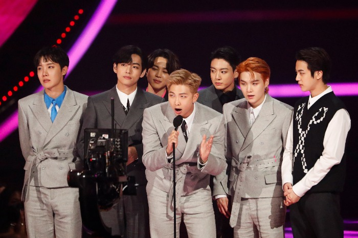BTS receives the award for artist of the year at the American Music Awards on Nov. 21.