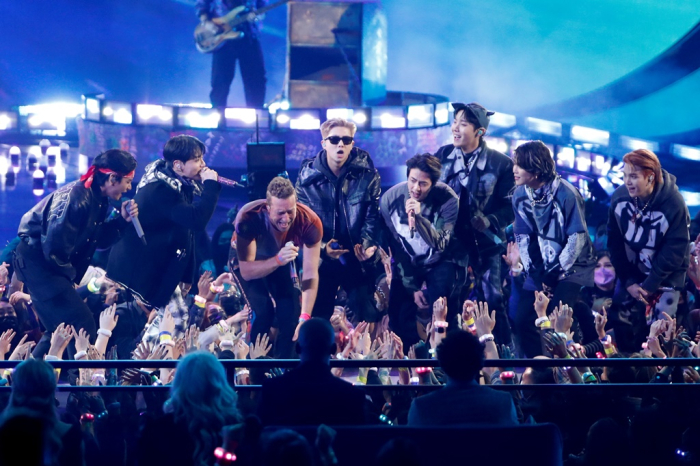 BTS and Coldplay perform during the annual 49th Annual American Music Awards on Nov. 21