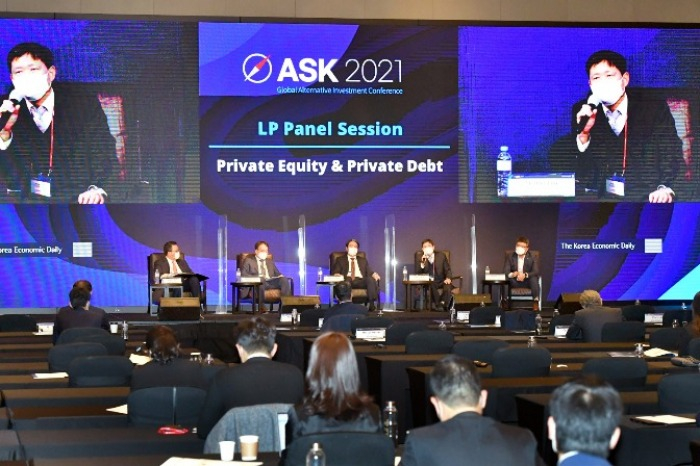 Korea Post's head of alternative investment division Charles Lim speaks at ASK 2021