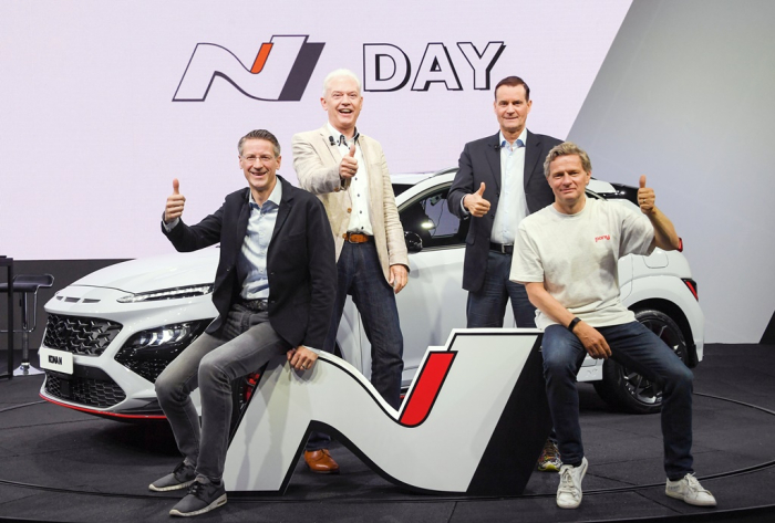 Albert Biermann (second left), Hyundai president and head of the R&D division, poses alongside other company executives in front of the Hyundai Kona N, a high-performance SUV (Courtesy of Hyundai Motor)