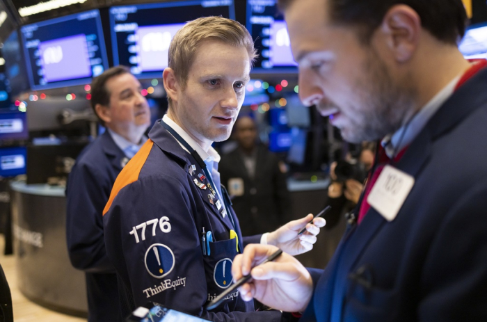 Traders on the floor of the New York Stock Exchange