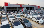 K Car's evolution into top Korean used car sales platform