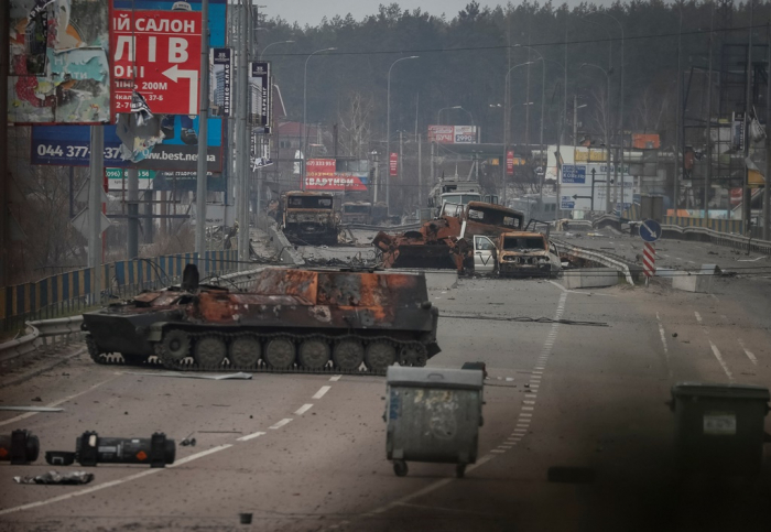 Wreckage　of　a　Russian　Armored　Personnel　Carrier　and　military　vehicles　are　seen　on　the　front　line　near　Kyiv　on　March　29,　2022　as　Russia's　invasion　of　Ukraine　continues　(Courtesy　of　Reuters,　Yonhap)