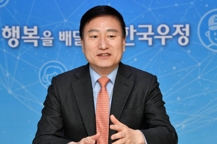 Korea Post President Son Seung-hyun speaks during an interview in February