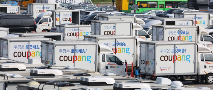 Coupang delivery trucks parked in Seoul