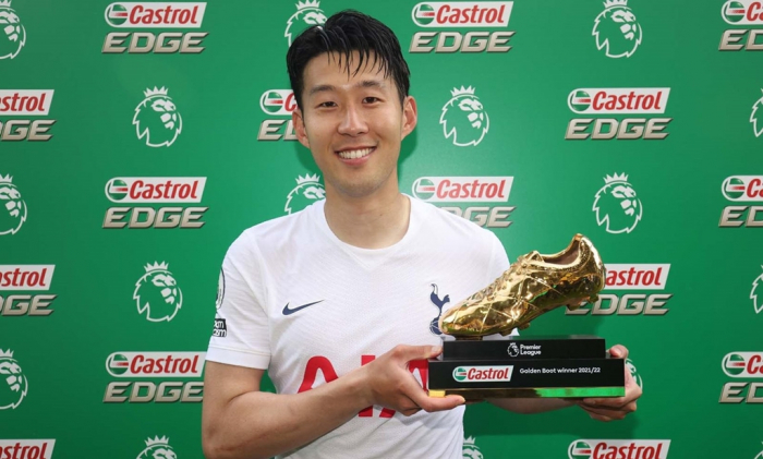Son holding the Golden Boot trophy after ending this year's season as the joint top scorer in the Premier League