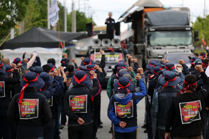 Truck drivers stage a walkout at the Yeosu Industrial Complex