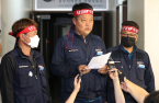 Korean truck drivers end strike as govt agrees to extend wage guarantee