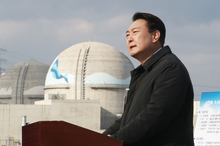 Then-candidate Yoon gives a speech on Dec. 29, 2021 during his presidential election campaign at the construction site of the Shin-Hanul No. 3 and No. 4 reactors, the building of which was suspended under the Moon administration.