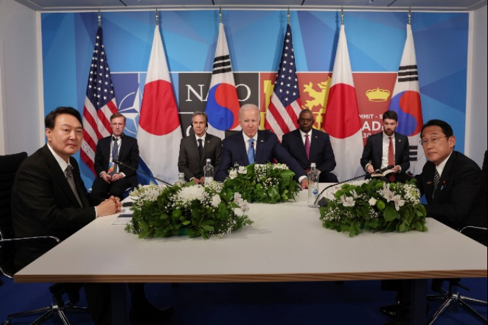 South Korean President Yoon Suk-yeol, President Biden and Japanese Prime Minister Fumio Kishida in Madrid on Wednesday.