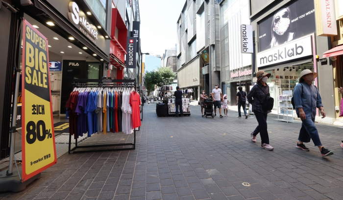 A street in Myeong-dong, the main shopping district in Seoul, is also not crowded