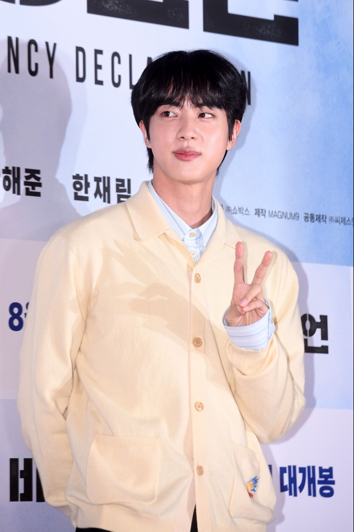 Jin poses for the cameras at a movie screening in Seoul on Aug. 25, 2022