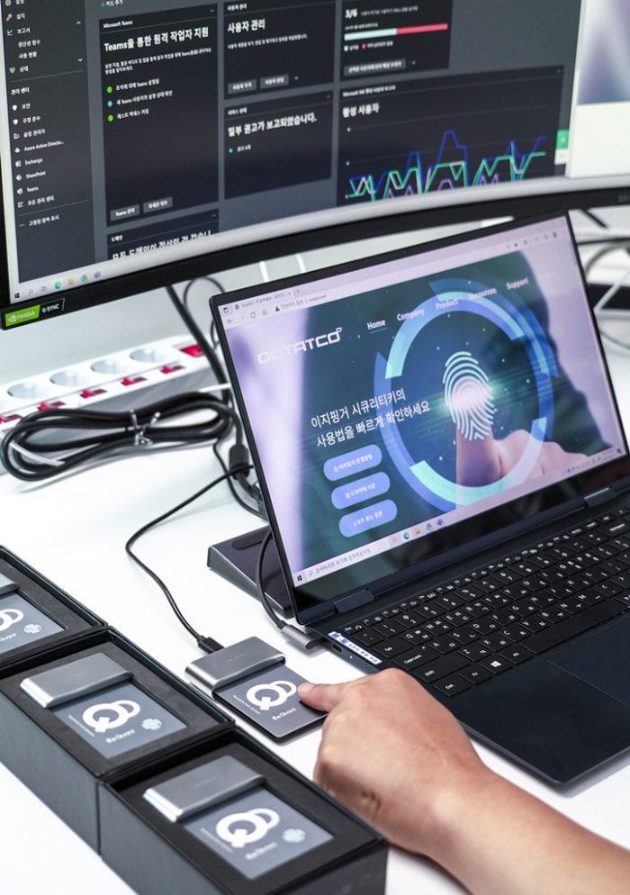 EzQuant, the world's first fingerprint recognition security key developed by SK Telecom, IDQ and Octatco based on the QRNG technology. It was launched in June 2021 (Courtesy of SK Telecom)