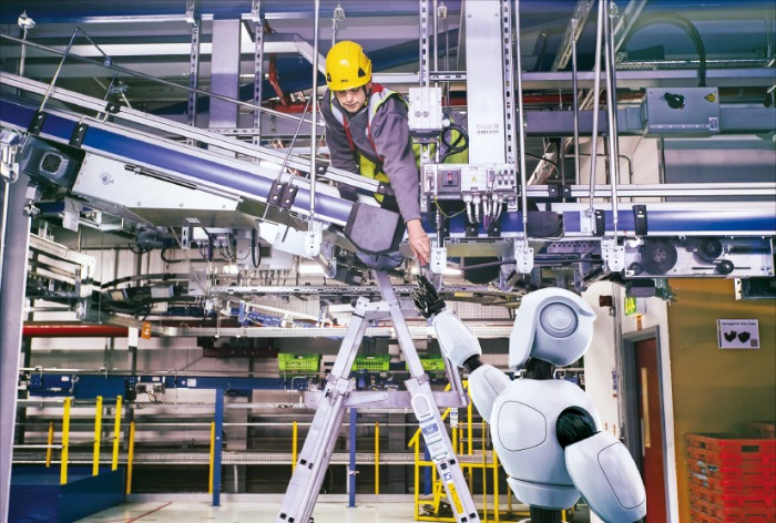 Robots hard at work at the automated Ocado Customer Fulfilment Centre in the UK