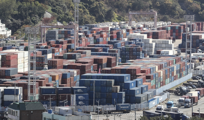 Containers piled up at an open-air storage area at the Port of Busan, South Korea, on Nov. 1, 2022 (Courtesy of Yonhap)