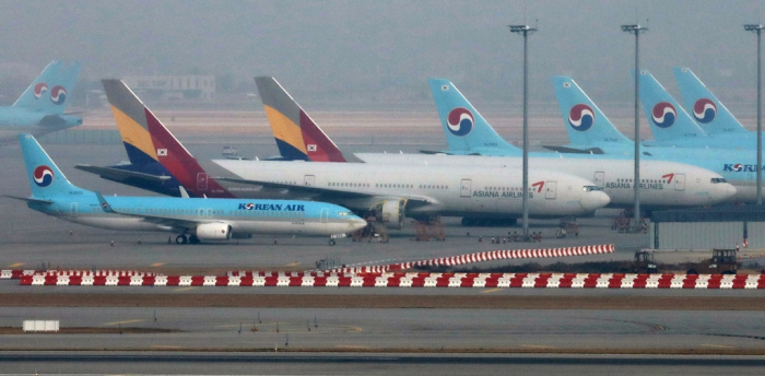  Korean　Air　and　Asiana　Airlines　aircraft　at　Incheon　International　Airport　(Courtesy　of　News1)