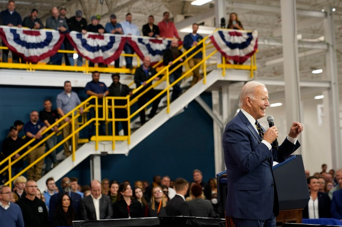 US President Joe Biden speaks at SK Siltron CSS' plant in Bay City, Michigan on Nov. 29