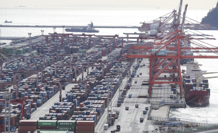 Containers piled up at an open-air storage area at the Port of Busan, South Korea, on Nov. 30, 2022 (Courtesy of Yonhap)
