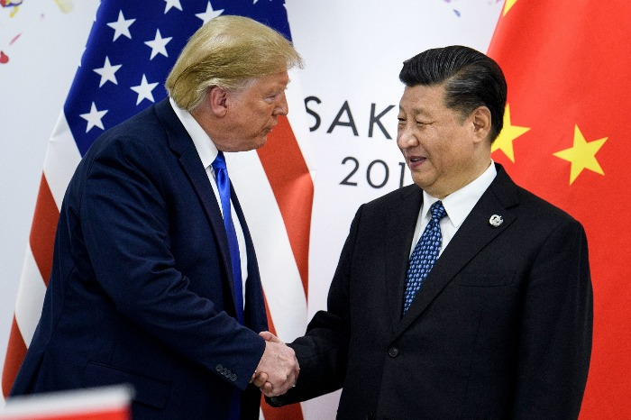 Donald Trump and Xi Jinping at the G20 summit in Osaka in 2019 (Courtesy of Yonhap)