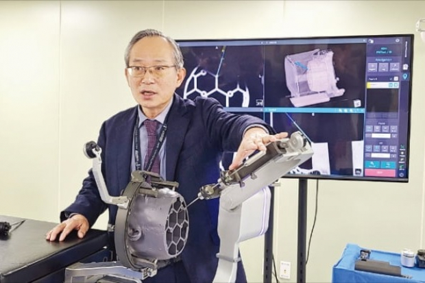 Koh Young CEO Koh Kwang-il discusses its brain surgery robot at Yongin R&D center, Gyeonggi Province, South Korea