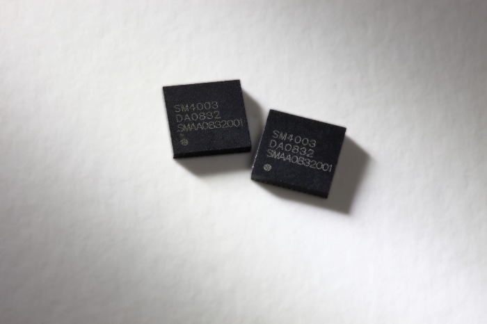 DB　HiTek's　analog　chips　(Courtesy　of　DB　HiTek)