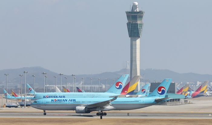 Aircraft　of　Korean　Air　and　Asiana　at　Incheon　International　Airport,　South　Korea’s　main　gateway　(Courtesy　of　Yonhap)