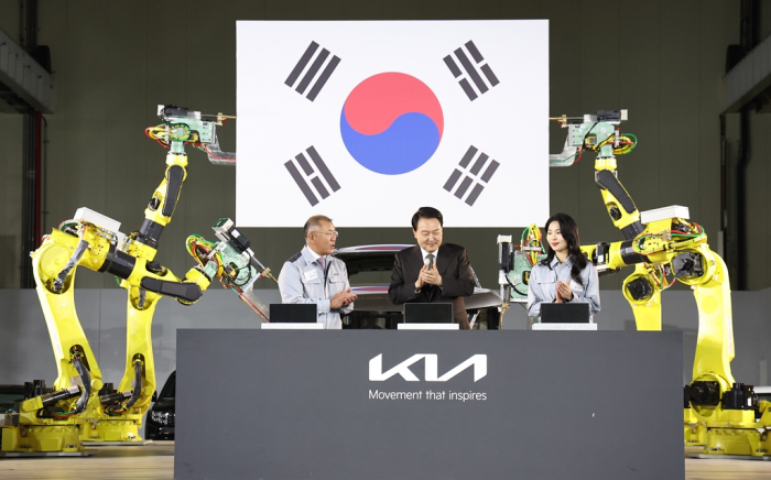 Korean President Yoon Suk Yeol (center) and Hyundai Motor Chairman Chung Euisun (left) at Kia's EV plant ground-breaking ceremony, March 2023 in Ulsan, Korea