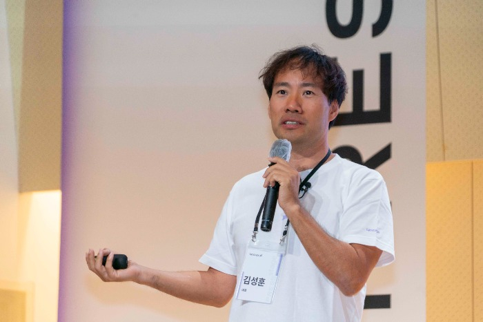 Upstage CEO Kim Seong-hoon speaks onstage during a May 16, 2023 press conference