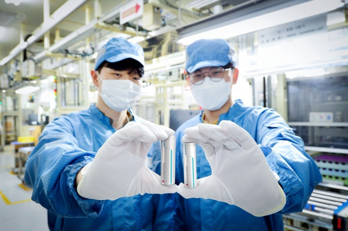 LG Energy employees at the Ochang plant showcase its flagship 2170 cylindrical batteries on May 25, 2023