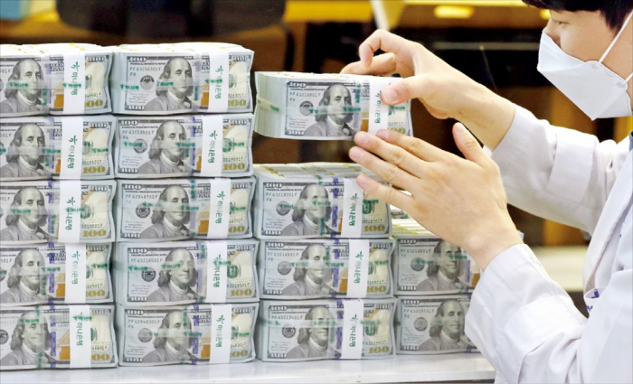 The won is strengthening against the dollar, bucking the global trend