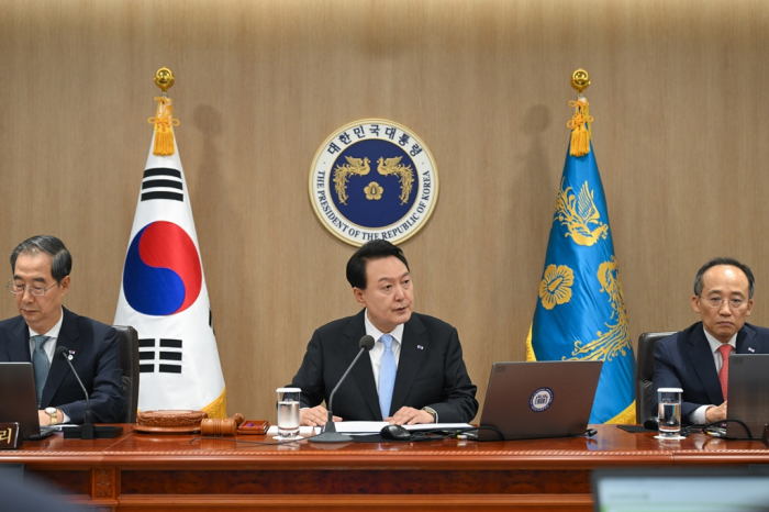 South Korean President Yoon Suk Yeol (center) holds a cabinet meeting on June 13, 2023