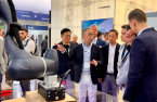 Doosan vice chairman visits robotics trade show Automatica