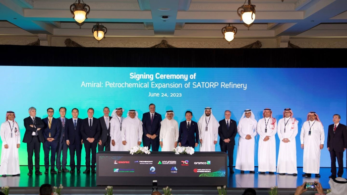 A　signing　ceremony　of　the　Amiral　project　by　Saudi　Aramco　and　TotalEnergies　for　a　future　petrochemicals　facility　expansion　at　the　SATORP　refinery　in　Saudi　Arabia　on　June　24,　2023.　Hyundai　E&C　wins　a　　billion　deal　in　the　project　(Courtesy　of　Aramco)