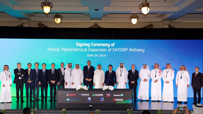 A signing ceremony of the Amiral project by Saudi Aramco and TotalEnergies for a future petrochemicals facility expansion at the SATORP refinery in Saudi Arabia on June 24, 2023. Hyundai E&C wins a billion deal in the project (Courtesy of Aramco)