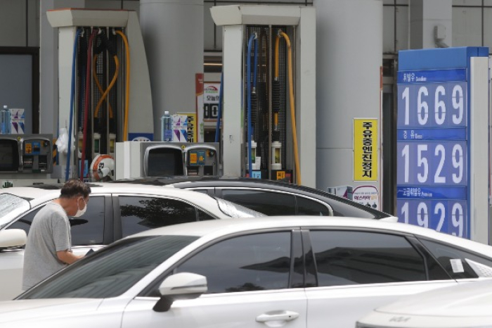 A　gas　station　in　Seoul　(Courtesy　of　Yonhap)