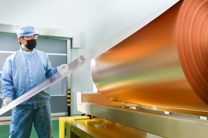 An SK Nexilis employee checks copper foil at its South Korean plant (File photo, courtesy of SKC)
