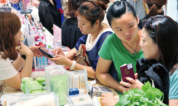 Chinese tourists at a Lotte Duty Free shop in central Seoul