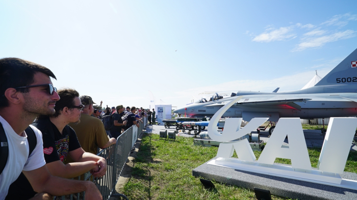 Visitors to the Radom Airshow in Poland watch KAI's FA-50 fighter jet on display