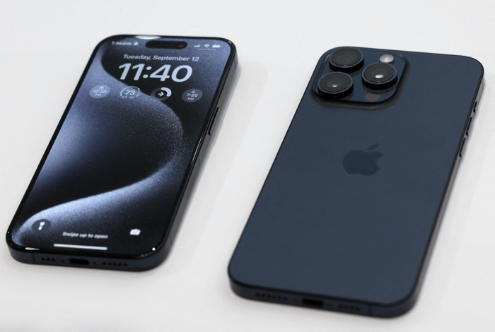 The new iPhone 15 Pro and iPhone 15 Pro Max on display at an Apple event in Cupertino, California on Sept. 12